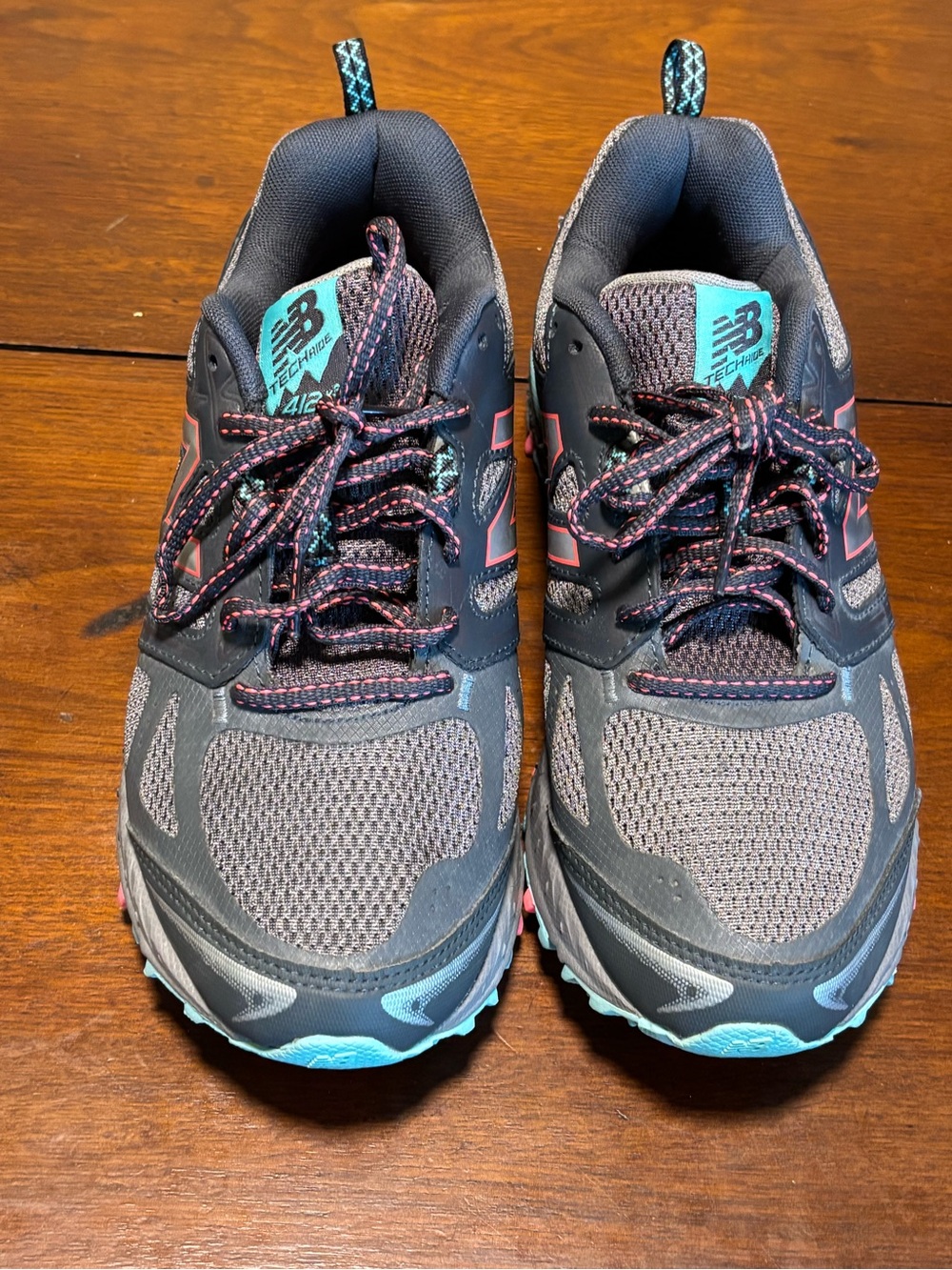 New Balance Women's Gray Trail Runners with Teal and Pink Details size 7.5
